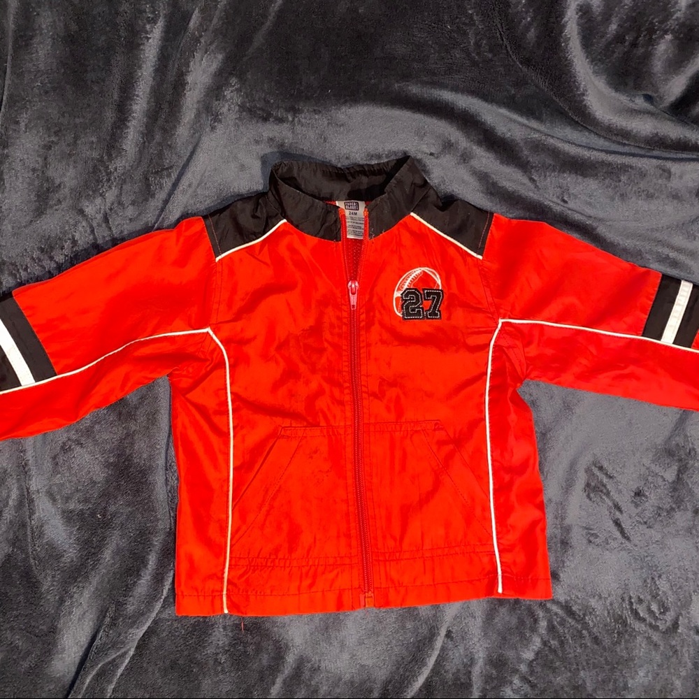 Red Windbreaker